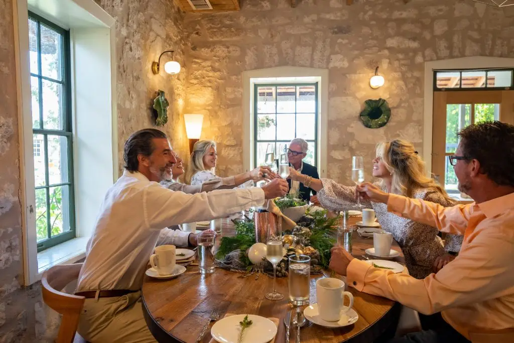 Friends gathering for tea and champagne in Fredericksburg, Texas