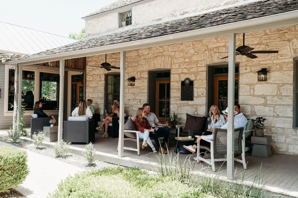 Guests enjoy al fresco dining on the patio of Hill Country Herb Garden restaurant.